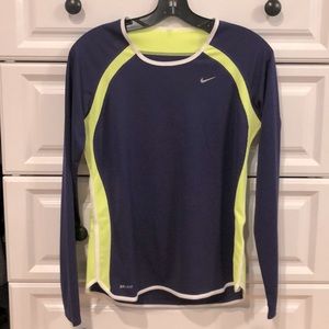 NWOT. Nike Dri-Fit. 100% polyester, great colors. Purple, chartreuse, and white.